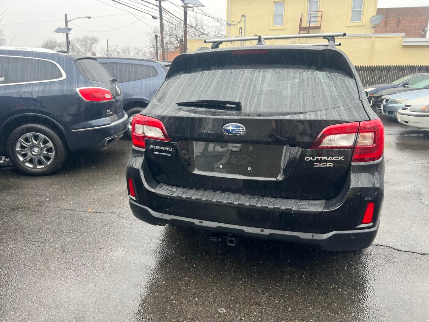 2017 BLACK /Brown Leather Subaru Outback 2.5i Touring (4S4BSETCXH3) with an 2.5L H4 DOHC 16V engine, 6A transmission, located at 1018 Brunswick Ave, Trenton, NJ, 08638, (609) 989-0900, 40.240086, -74.748085 - Photo#6